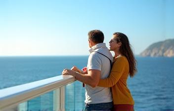 Image of a family enjoying the view from a ferry deck.